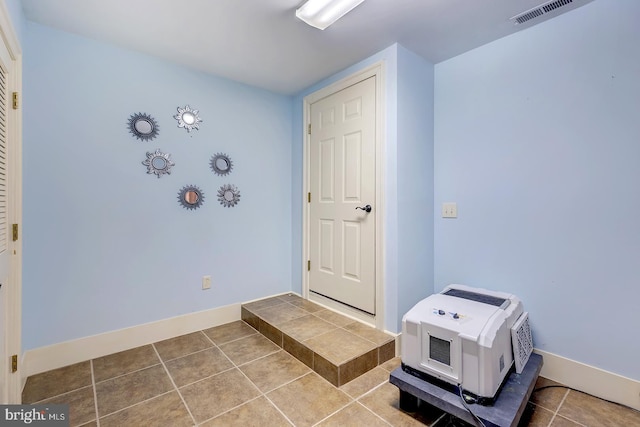 interior space with tile patterned flooring