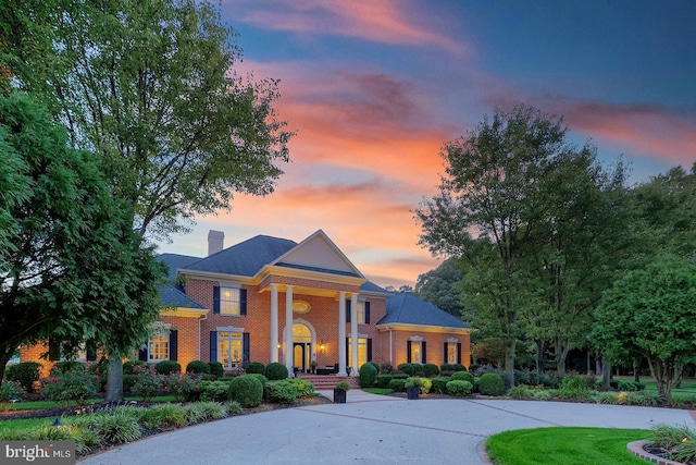20459 Troyer Ln, Lincoln, DE 19960 - neoclassical / greek revival house featuring brick siding and a chimney