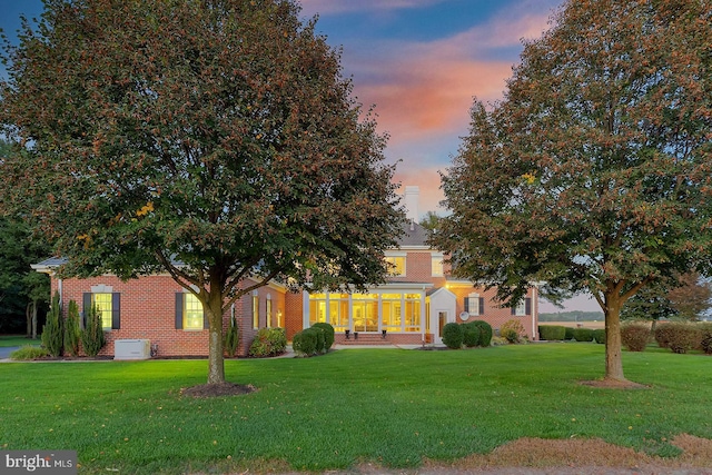 20459 Troyer Ln, Lincoln, DE 19960 - obstructed view of property with brick siding and a front lawn