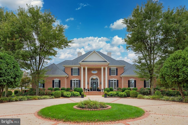 neoclassical / greek revival house with covered porch