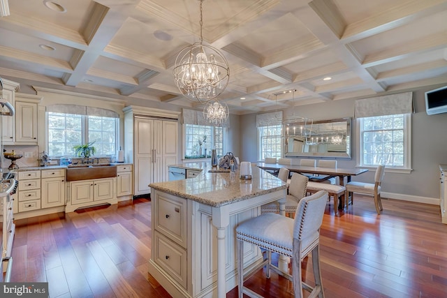 20459 Troyer Ln, Lincoln, DE 19960 - kitchen featuring a wealth of natural light, a notable chandelier, dark wood-style floors, and cream cabinetry