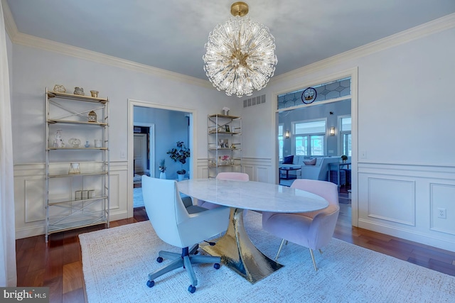 20459 Troyer Ln, Lincoln, DE 19960 - dining room with a decorative wall, wood finished floors, a notable chandelier, and visible vents