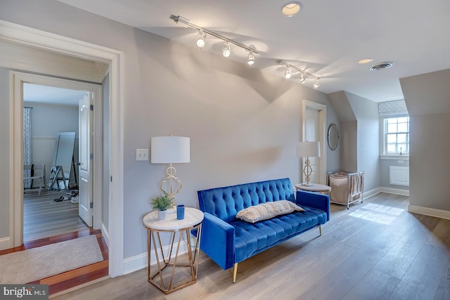 living area featuring hardwood / wood-style flooring