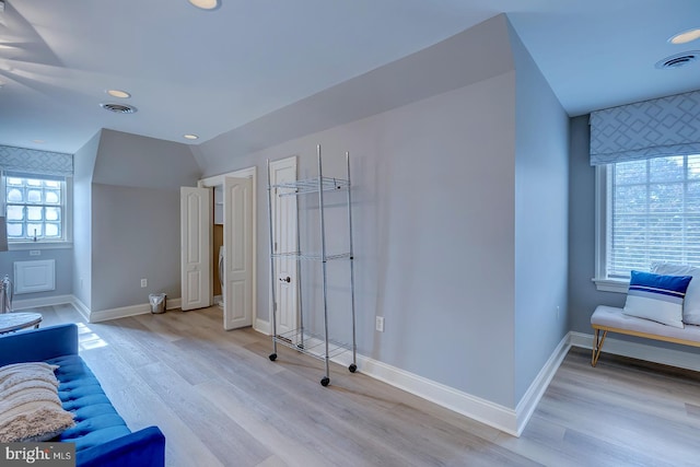 sitting room with light hardwood / wood-style flooring