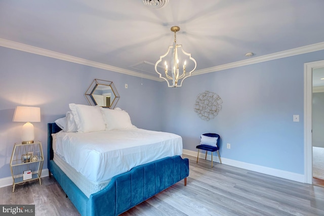 bedroom with crown molding, a notable chandelier, and hardwood / wood-style flooring