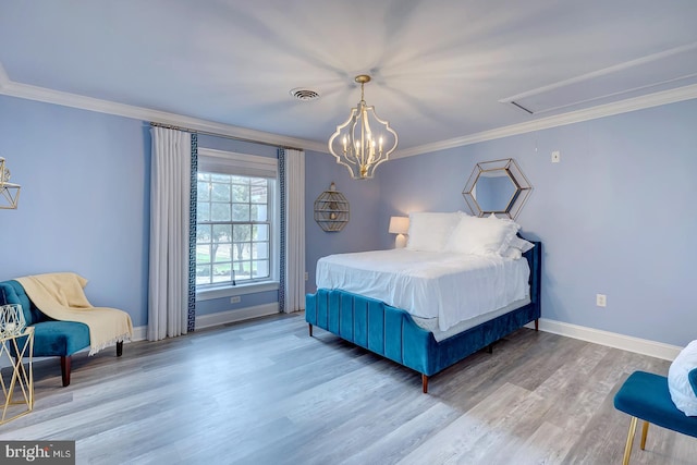 bedroom with ornamental molding and light hardwood / wood-style flooring