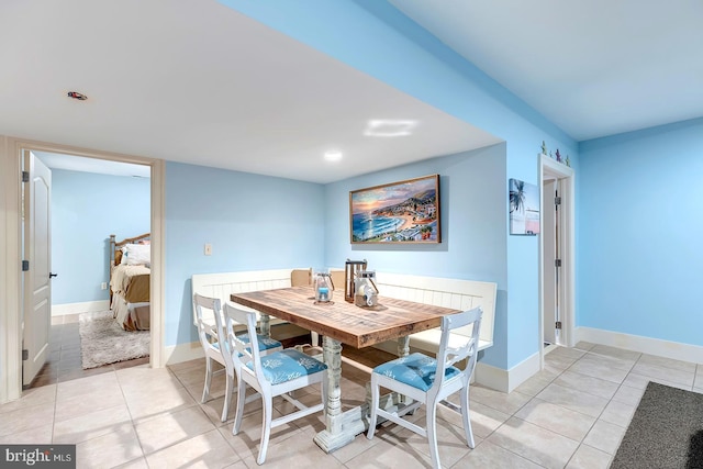 view of tiled dining space