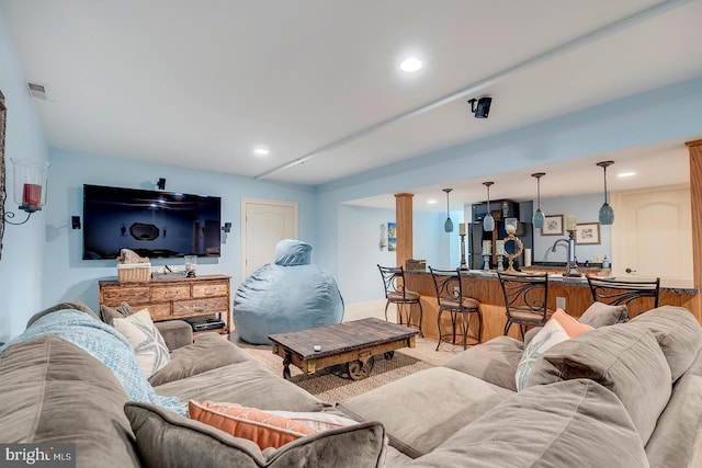 living room featuring indoor wet bar