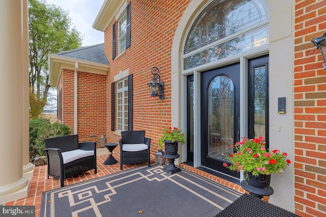 20459 Troyer Ln, Lincoln, DE 19960 - doorway to property featuring roof with shingles and brick siding