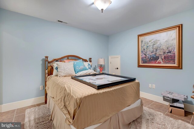 20459 Troyer Ln, Lincoln, DE 19960 - bedroom featuring visible vents, baseboards, and light tile patterned floors