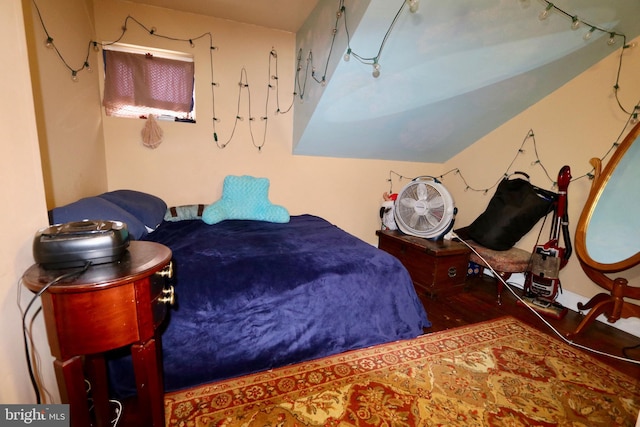 bedroom with hardwood / wood-style floors