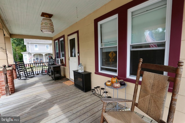 deck with cooling unit and covered porch