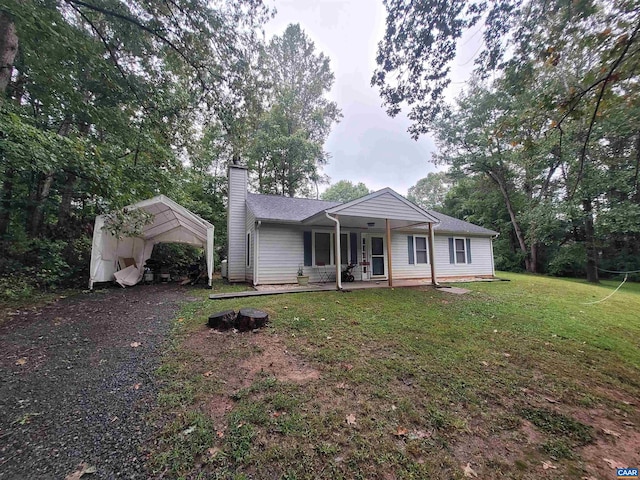 ranch-style home with a front lawn