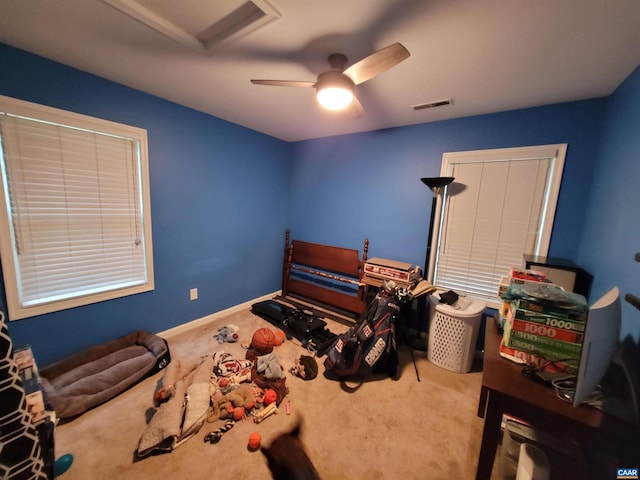 bedroom featuring ceiling fan and carpet floors