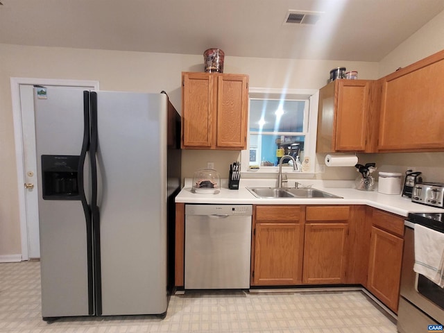 kitchen with stainless steel appliances and sink