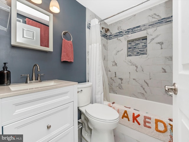 full bathroom with vanity, toilet, and shower / tub combo with curtain