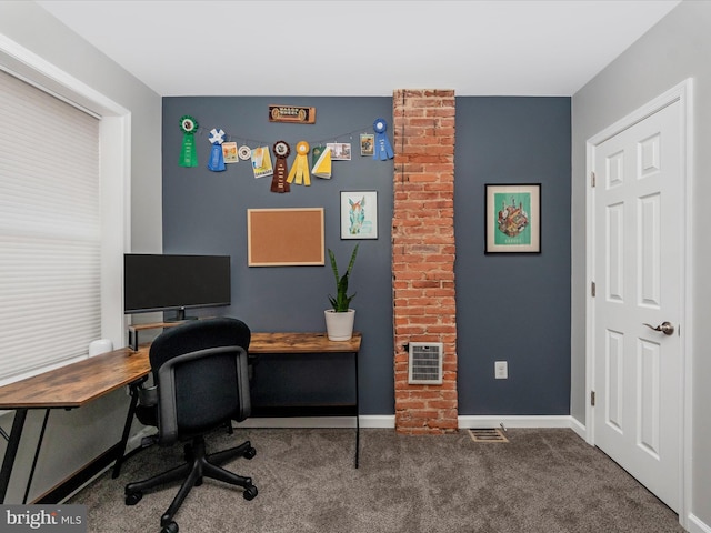 carpeted office space featuring heating unit