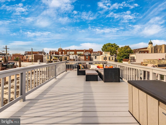 wooden deck with an outdoor hangout area