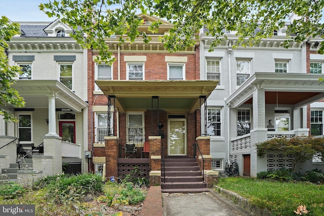 view of property with covered porch