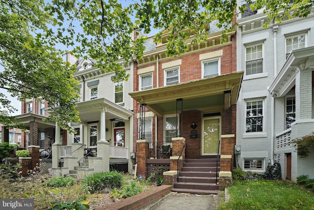 view of property with covered porch