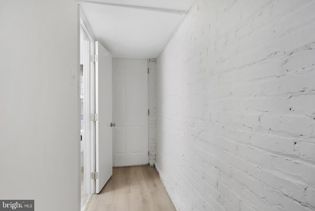 hallway with light wood-type flooring