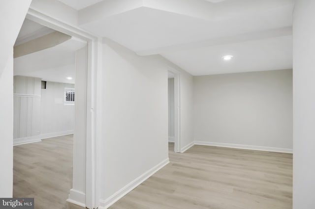 hallway with light wood-type flooring