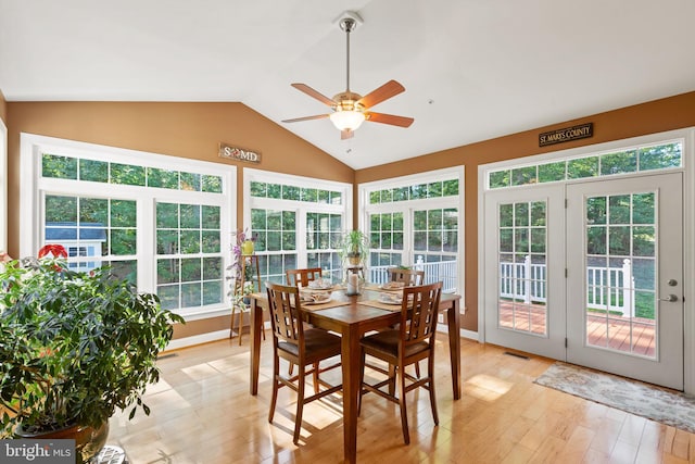 sunroom / solarium with vaulted ceiling and ceiling fan