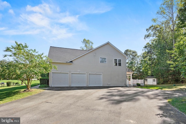 view of property exterior featuring a yard