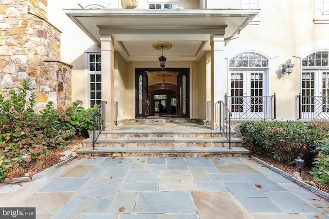 doorway to property featuring french doors