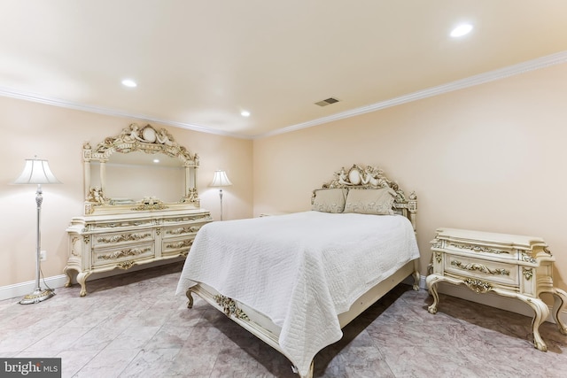 bedroom with ornamental molding