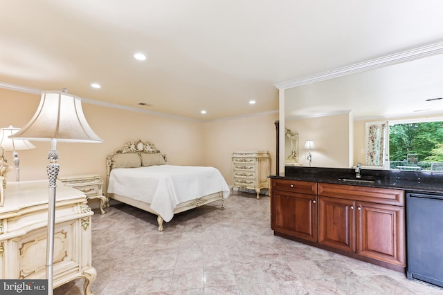 bedroom featuring ornamental molding and sink