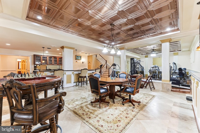 dining room with ornamental molding and ceiling fan