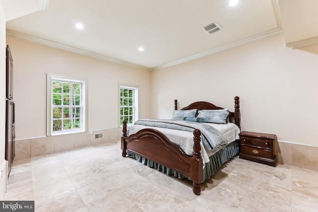 bedroom featuring crown molding