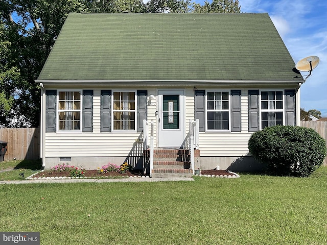 cape cod house with a front yard