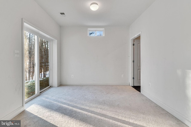 view of carpeted spare room