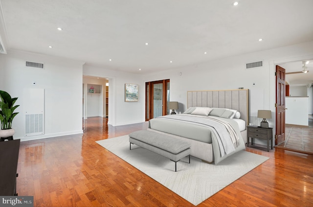 bedroom featuring hardwood / wood-style flooring