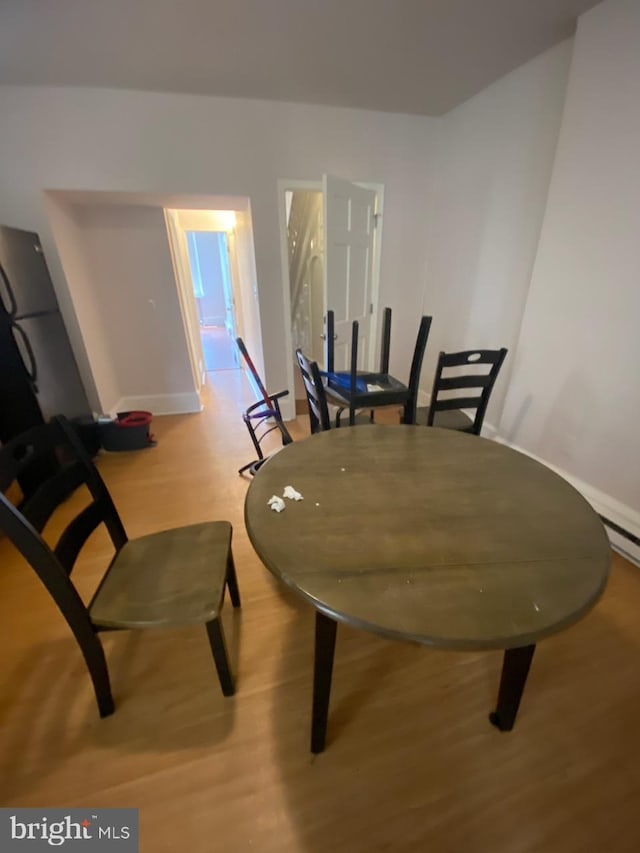 dining room featuring light hardwood / wood-style floors