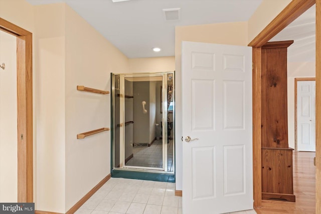 corridor featuring light wood-type flooring