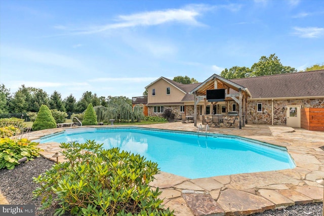 view of pool with a patio