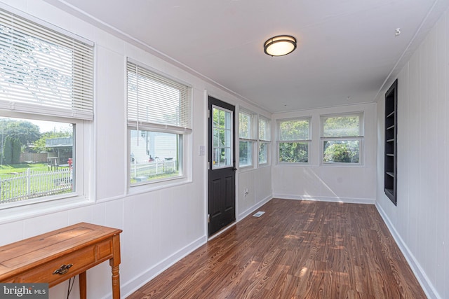 sunroom with plenty of natural light