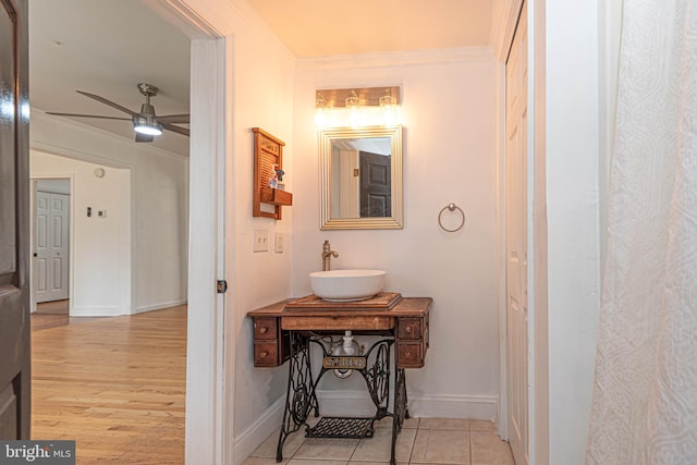 bathroom featuring ceiling fan, hardwood / wood-style flooring, and vanity