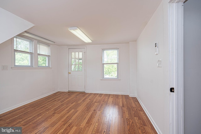 spare room featuring hardwood / wood-style flooring