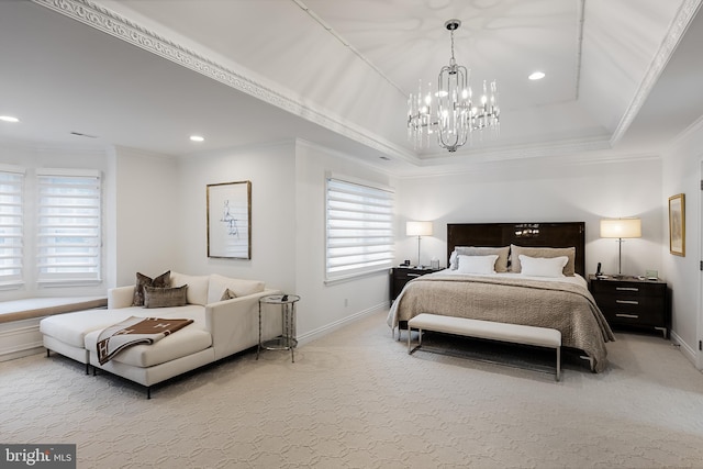 carpeted bedroom with crown molding, a tray ceiling, and a notable chandelier