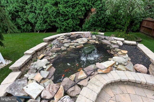 details featuring carpet floors and a small pond