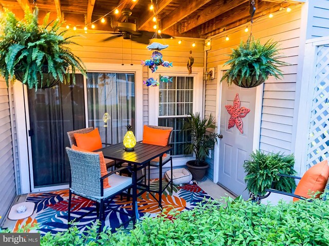 view of patio featuring ceiling fan