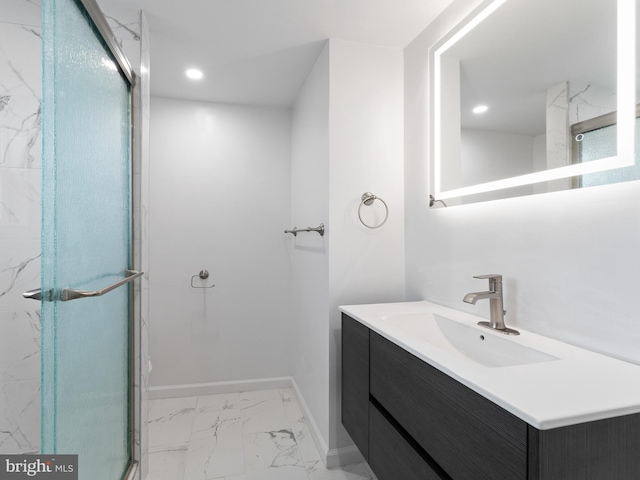 bathroom with vanity and an enclosed shower