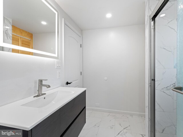 clothes washing area with light wood-type flooring and washing machine and dryer