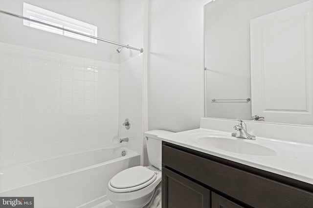 full bathroom featuring vanity, toilet, and washtub / shower combination