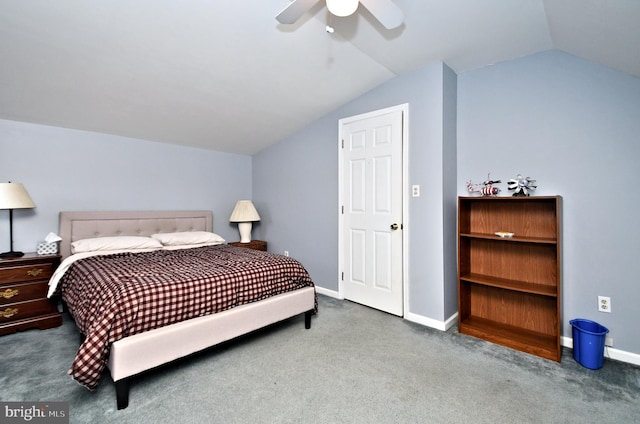 carpeted bedroom with vaulted ceiling and ceiling fan