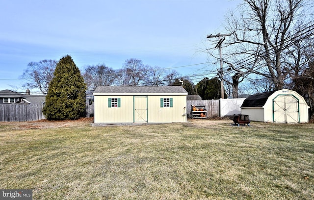 view of outbuilding featuring a yard